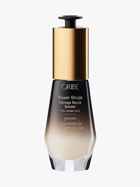 Oribe Power Drops Damage Repair Booster in branded component on a light gray background